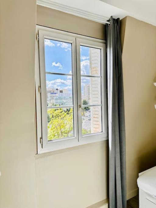 Appartement Vue Tour Eiffel Ligne 14 A Cote De Paris 让蒂伊 外观 照片
