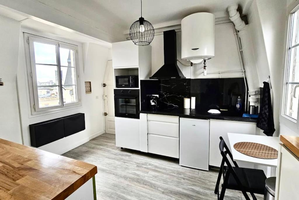 Appartement Vue Tour Eiffel Ligne 14 A Cote De Paris 让蒂伊 外观 照片